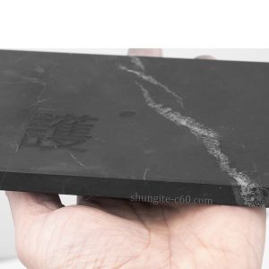 shungite plate in hand chinese protection symbol size
