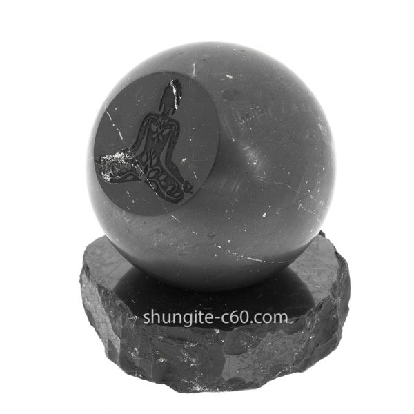 Shungite crystal sphere on a stand with Buddha