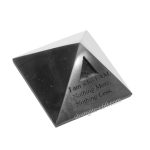 crystal pyramid black stone engraved text detail