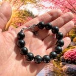 healing stone bracelet in hand size reference